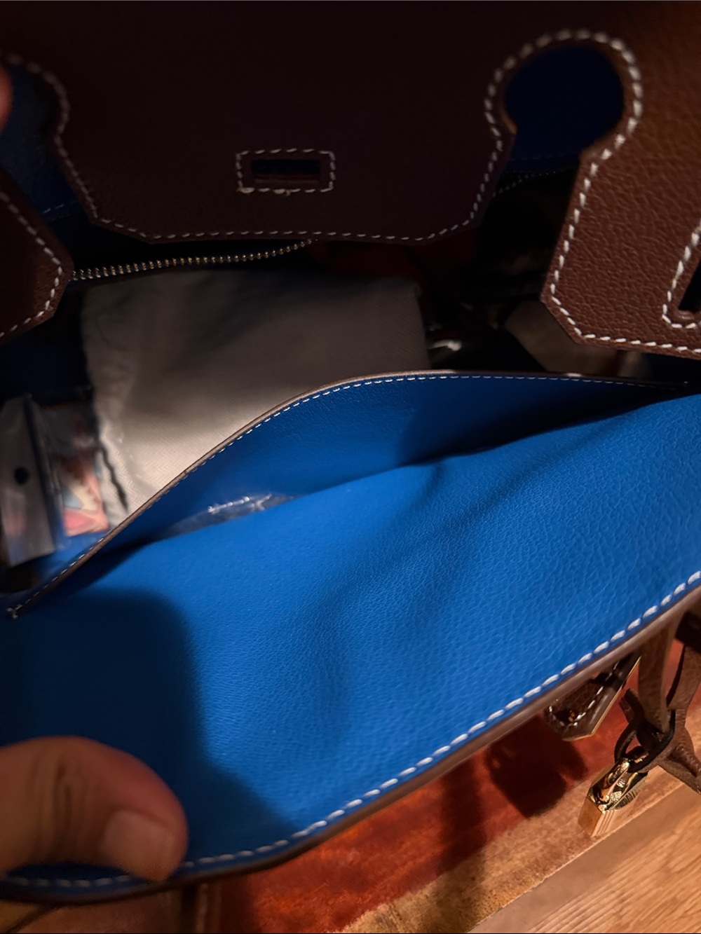 Barenia leather with contrast white stitching